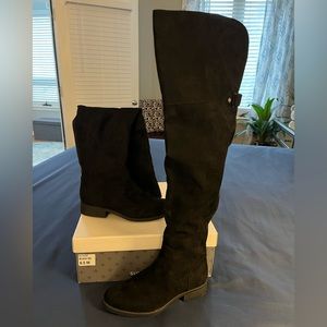 Knee high boots. Size 6 1/2 worn once. Color Black , zip on side.